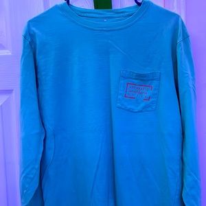 The stain on front is from a shadow. Small dirt stain on pitch pocket